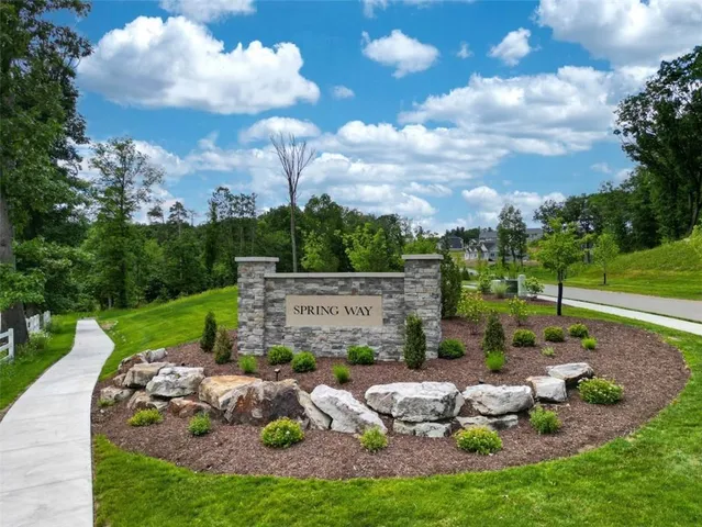 a view of a golf course with a lake
