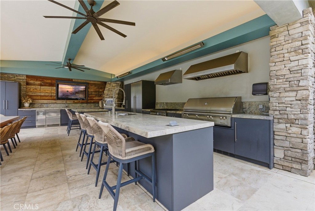 29131 Bouquet Canyon Road Silverado, CA 92676 - Photo 24 of 74 Outdoor kitchen with built-in BBQ, pizza oven and dining area