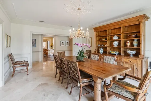 a kitchen with stainless steel appliances kitchen island granite countertop a sink and cabinets
