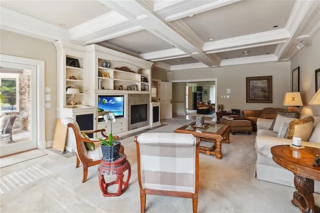 a kitchen with stainless steel appliances granite countertop a sink and a refrigerator