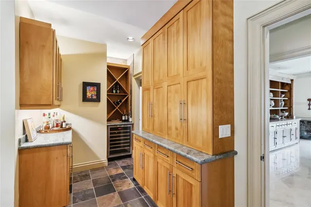 a spacious bedroom with a bed and a large window