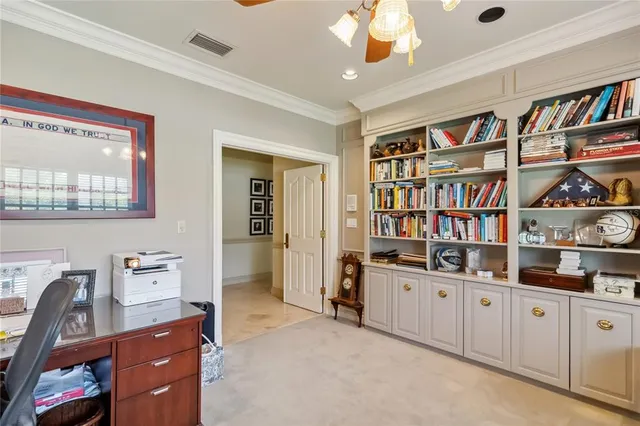 a bathroom with a double vanity sink a mirror and a bathtub