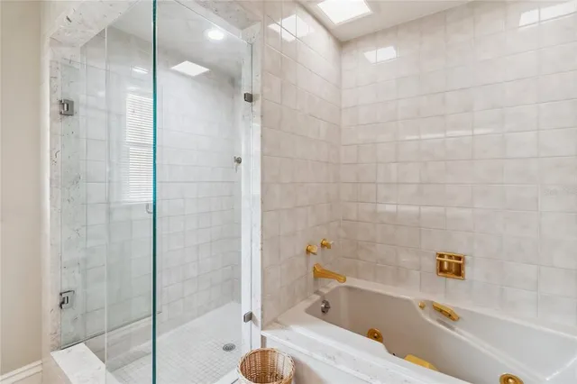 a bedroom with a bed and a dresser in it