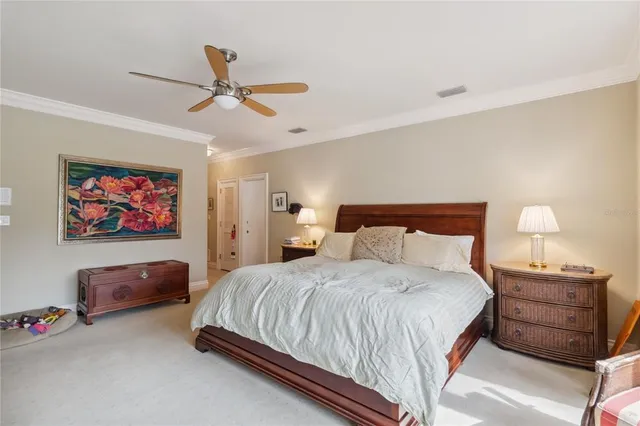 a view of a kitchen with fridge and workspace