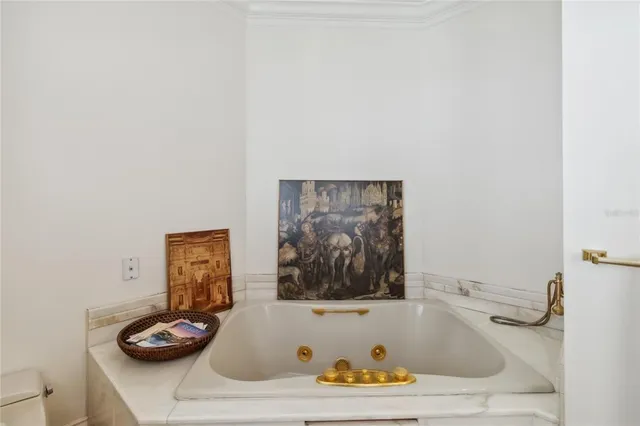 a dinning table and chairs in the patio of the house