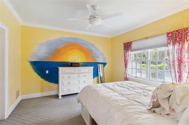 a view of a house with swimming pool and sitting area