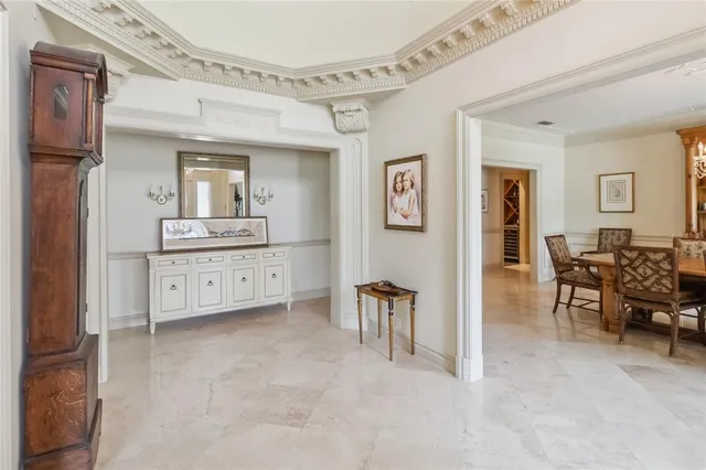 a view of a dining room with furniture and window