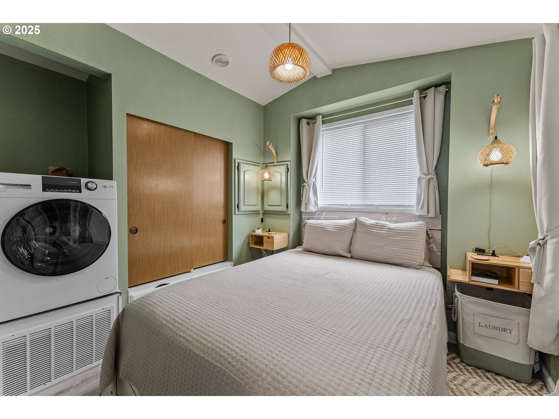 19921 Whaleshead Road, Unit M2 Brookings, OR 97415 - Photo 20 of 29 a bedroom with a bed and a view of bathroom