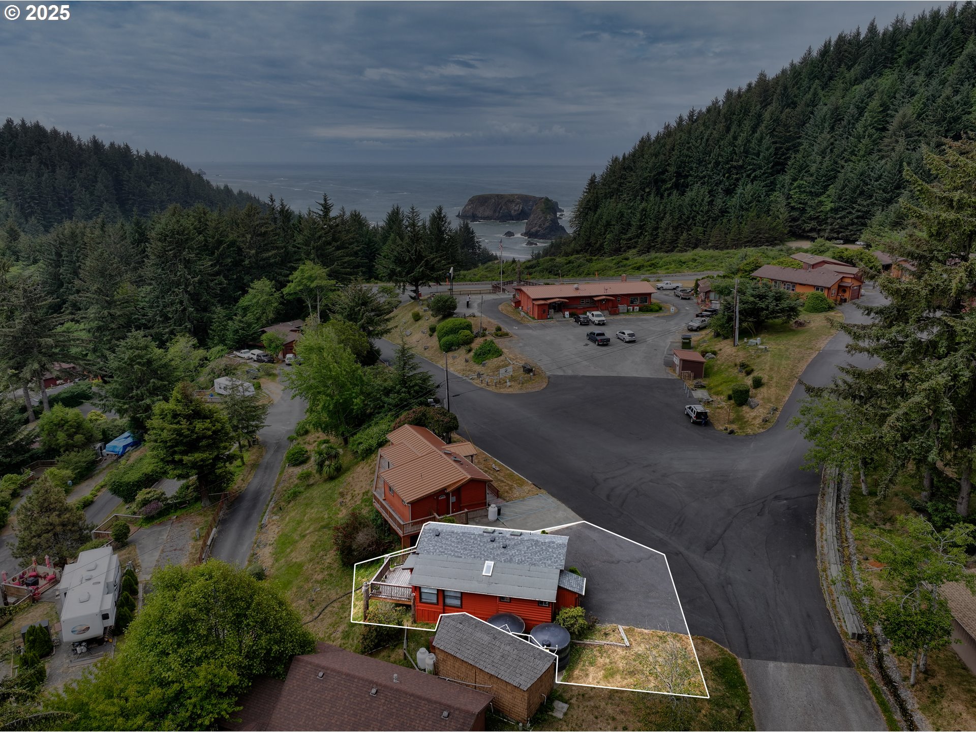 19921 Whaleshead Road, Unit M2 Brookings, OR 97415 - Photo 28 of 29 an aerial view of a house with a yard