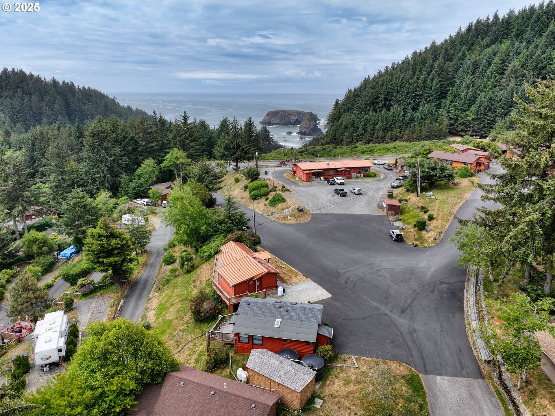 19921 Whaleshead Road, Unit M2 Brookings, OR 97415 - Photo 29 of 29 an aerial view of a house with a garden