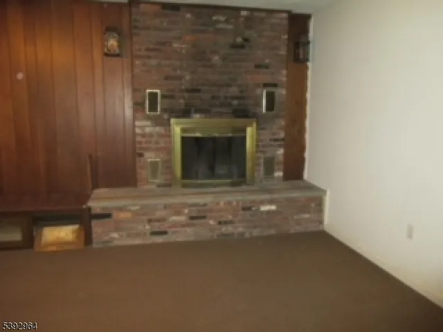 a living room with a fireplace