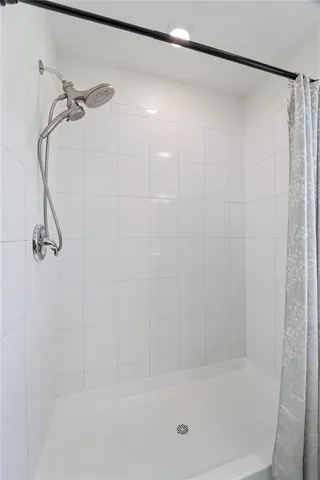 a view of a workspace with furniture and wooden floor