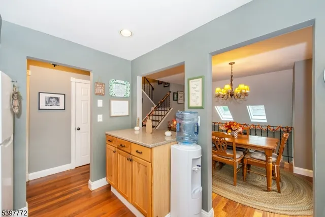 a view of a livingroom with furniture and wooden floor