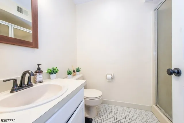 a bathroom with a sink and a toilet