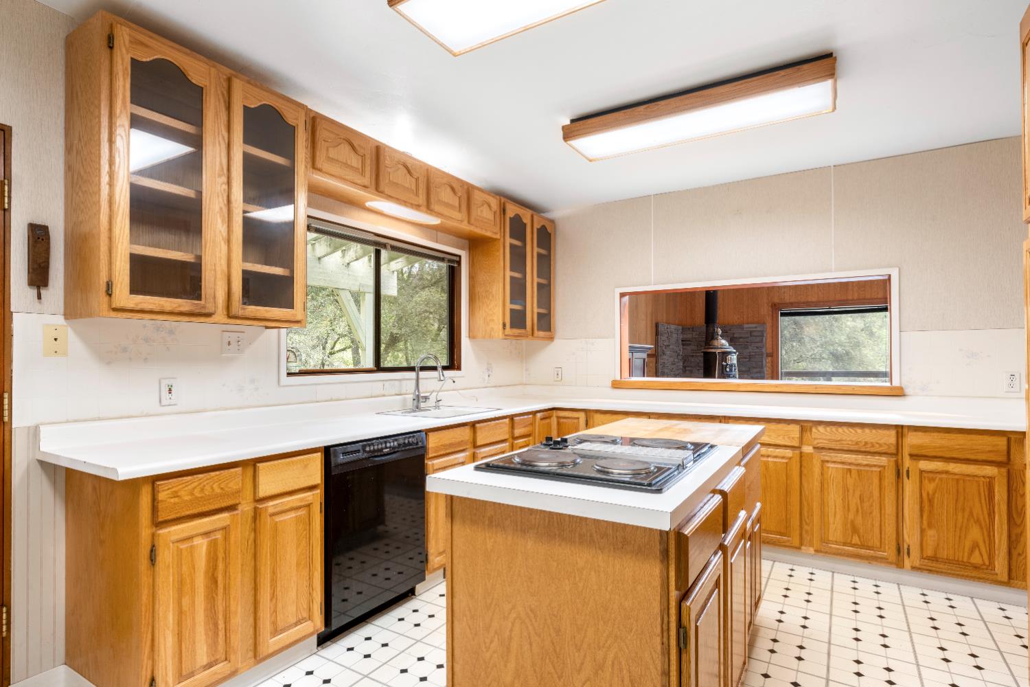7321 Morning Canyon Road Placerville, CA 95667 - Photo 14 of 39 a kitchen with stainless steel appliances granite countertop a sink and dishwasher next to a window
