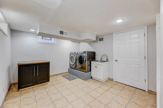 a view of a storage & utility room in a utility room