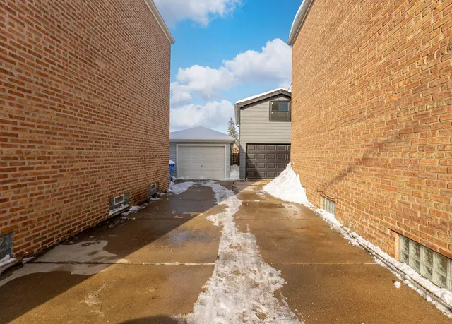 a view of a backyard of the house