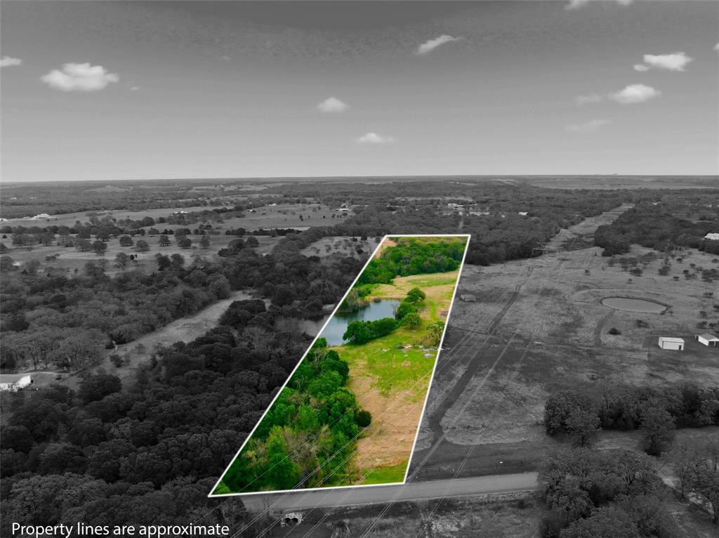 a view of a yard with a swimming pool