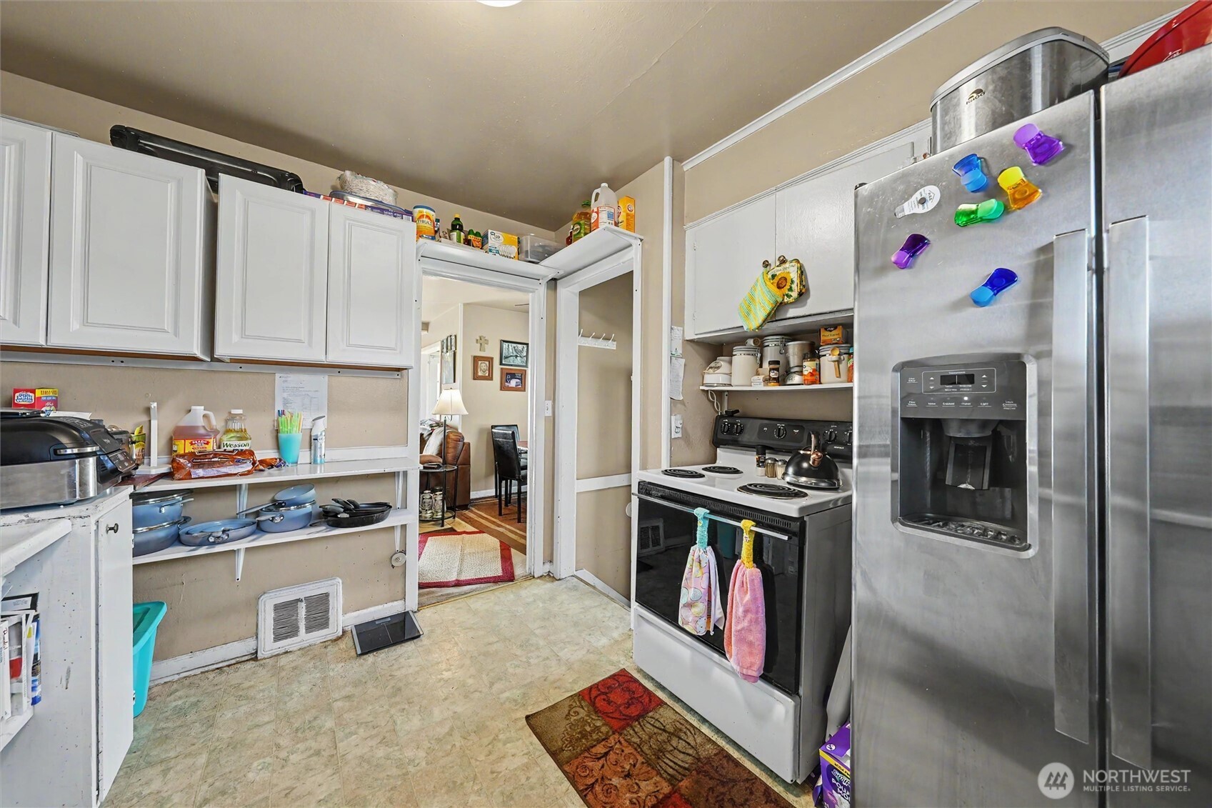 204 E Street Southwest Ephrata, WA 98823 - Photo 8 of 31 a kitchen with stainless steel appliances granite countertop a refrigerator and a stove top oven