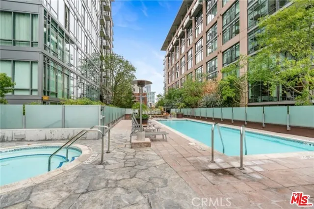 a backyard of a house with outdoor seating