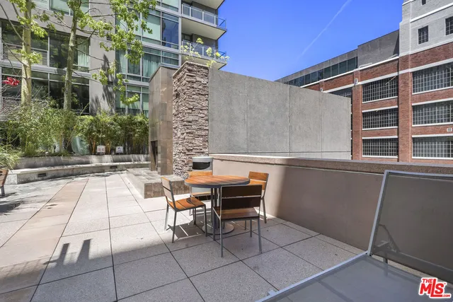 a backyard of a house with seating space