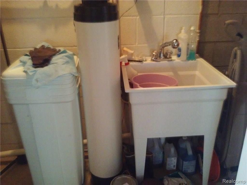 4660 Capac Road Capac, MI 48014 - Photo 48 of 65 This is a view of some of the utilities in the basement.