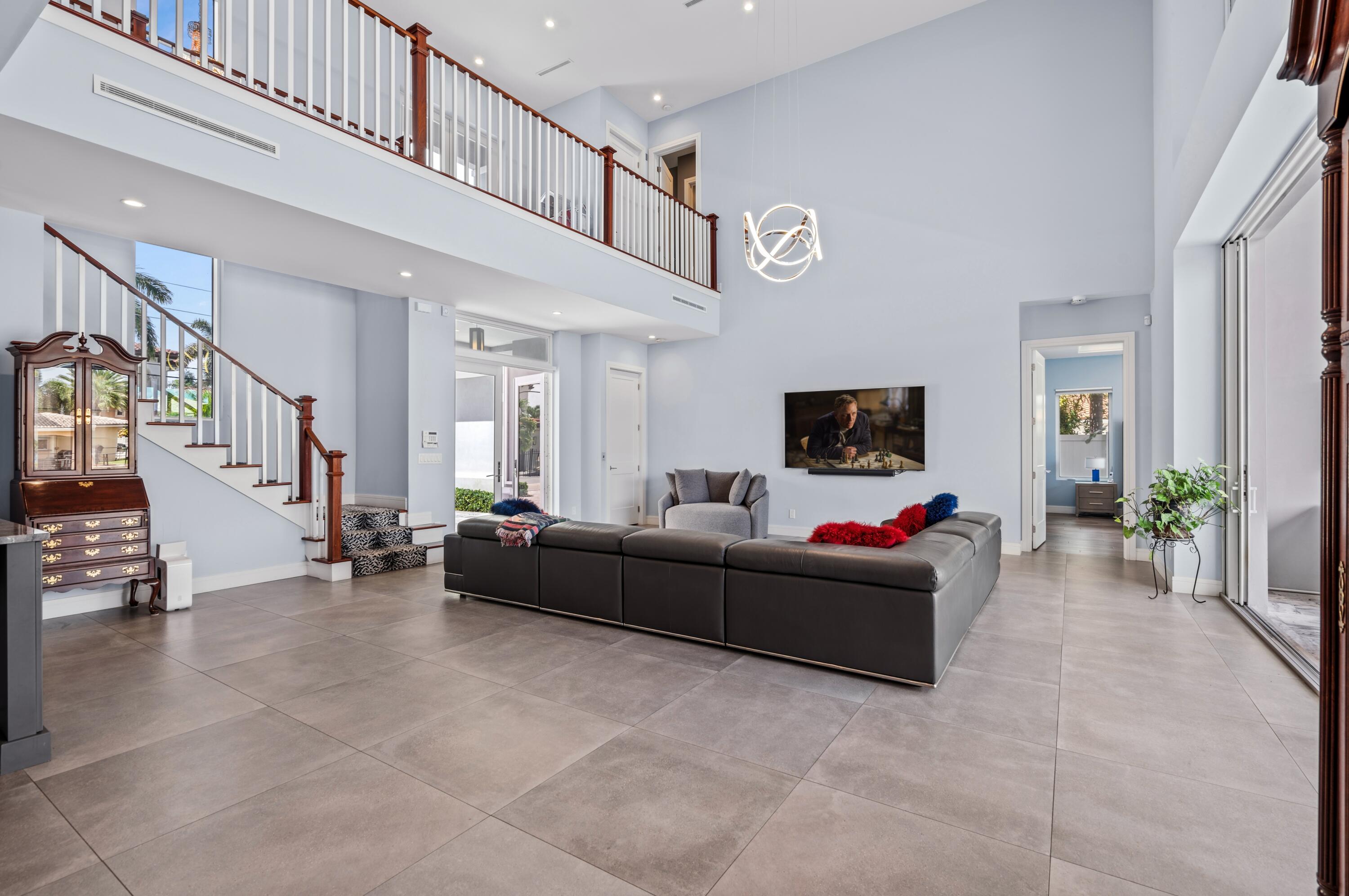 807 Dover Street Boca Raton, FL 33487 - Photo 6 of 47 a living room with furniture and a flat screen tv