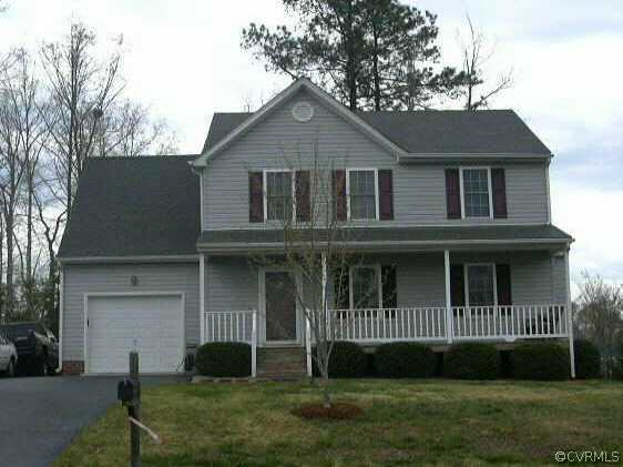 11300 Clear Ridge Drive Midlothian, VA 23112 - Photo 1 of 9 a front view of a house with a yard