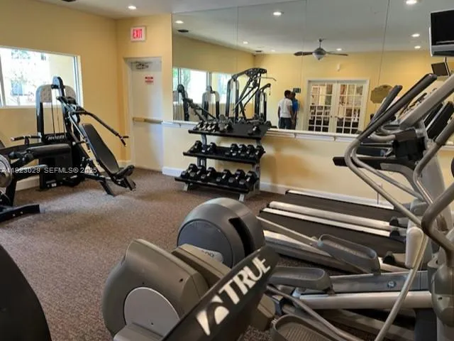 a view of a room with gym equipment