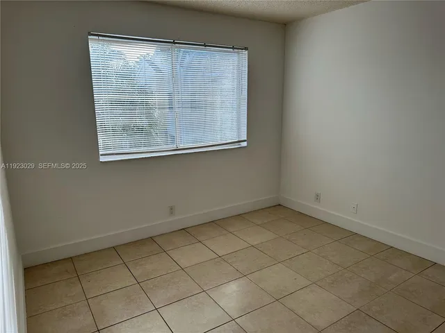 an empty room with a door