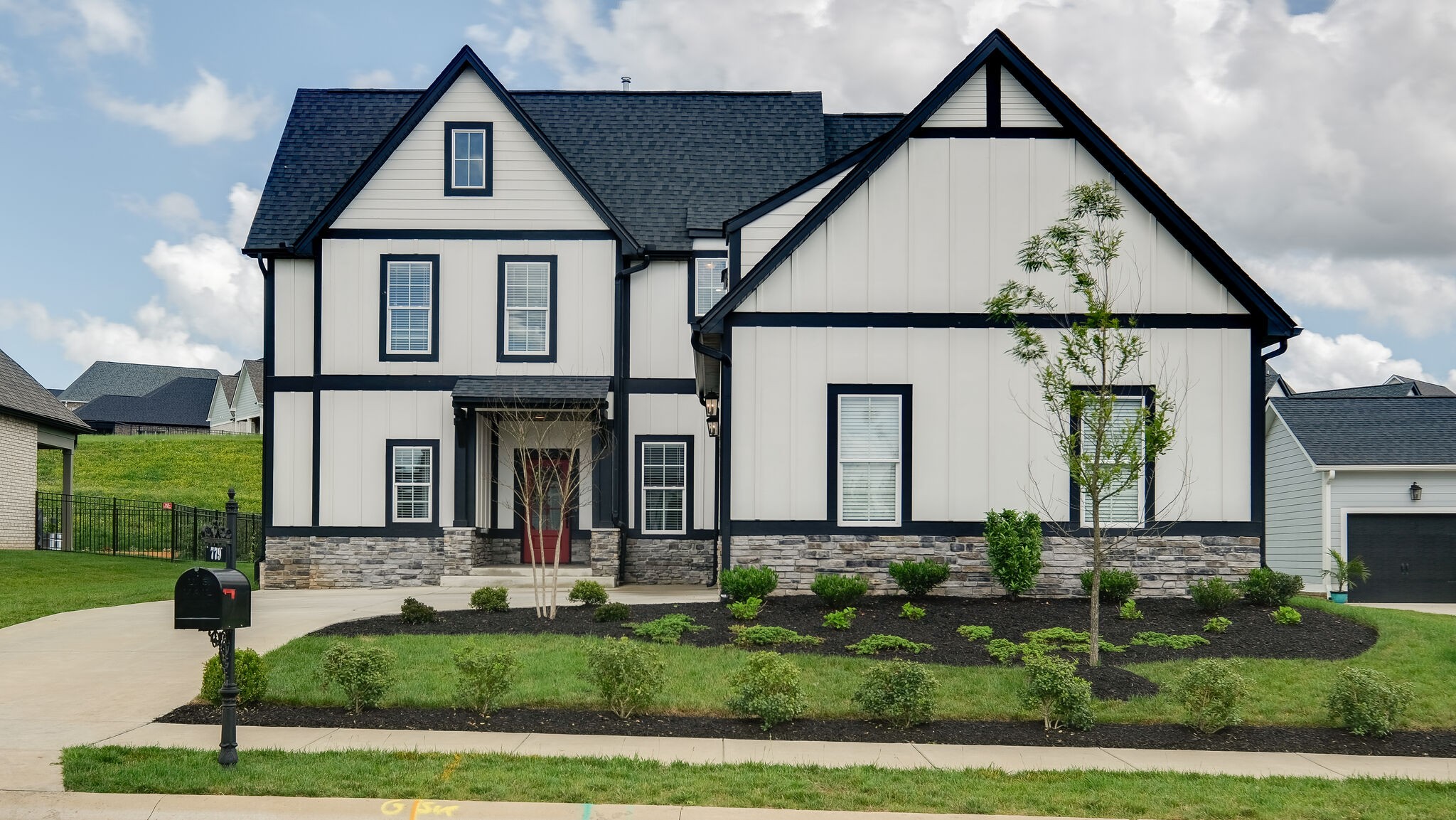 779 Plowson Road Mount Juliet, TN 37122 - Photo 1 of 44 a front view of a house with a yard