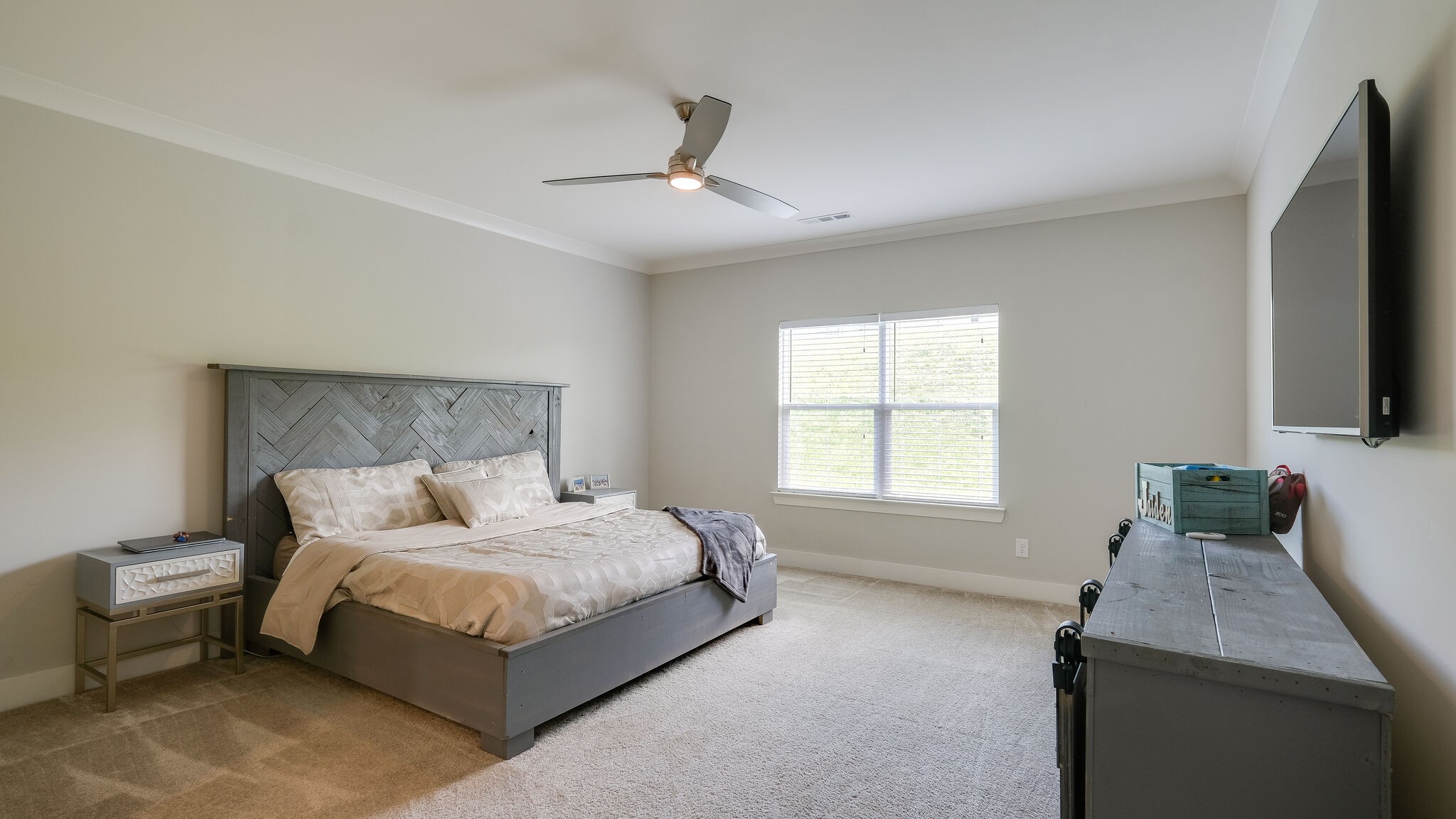 779 Plowson Road Mount Juliet, TN 37122 - Photo 17 of 44 a bedroom with a bed and a flat screen tv