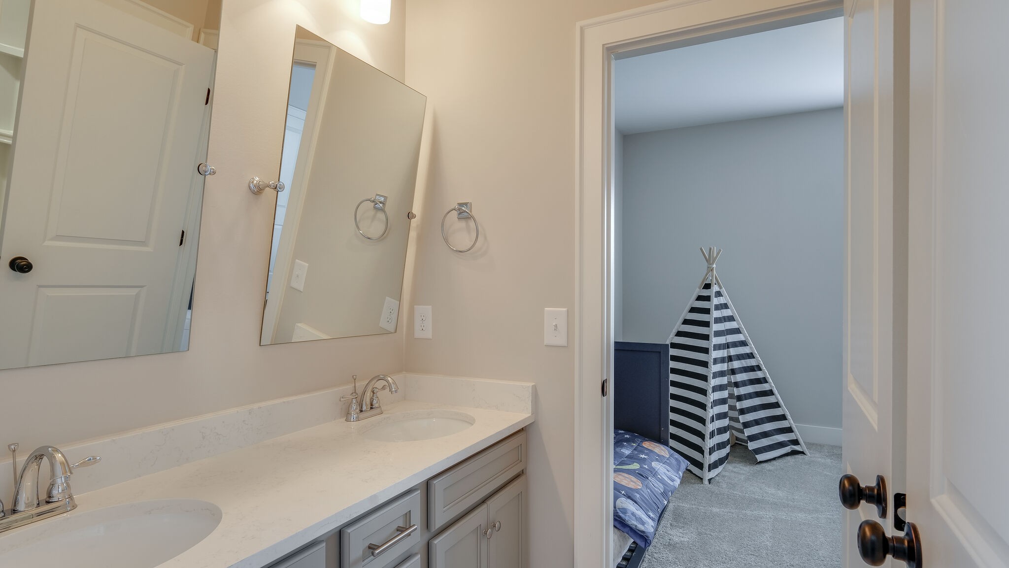 779 Plowson Road Mount Juliet, TN 37122 - Photo 26 of 44 a bathroom with a sink and a mirror