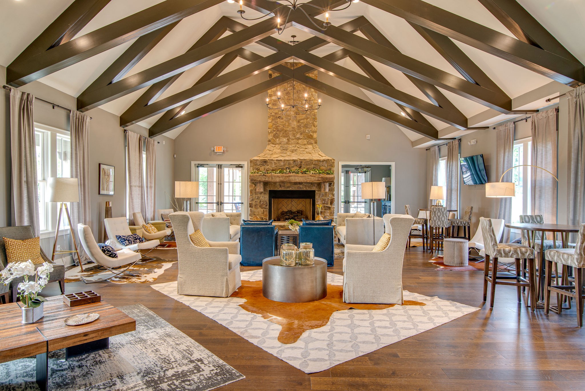 779 Plowson Road Mount Juliet, TN 37122 - Photo 42 of 44 a living room with furniture a fireplace and a chandelier