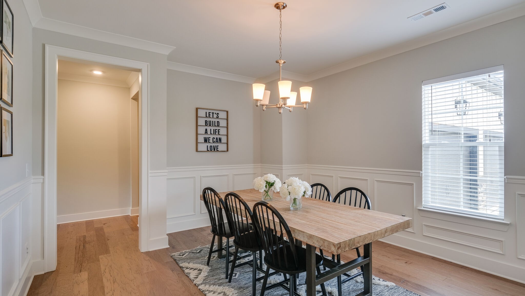 779 Plowson Road Mount Juliet, TN 37122 - Photo 5 of 44 a view of a dining room with furniture window and wooden floor