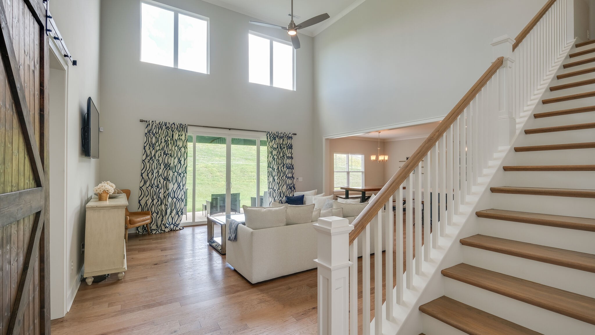 779 Plowson Road Mount Juliet, TN 37122 - Photo 7 of 44 a living room with furniture and a large window