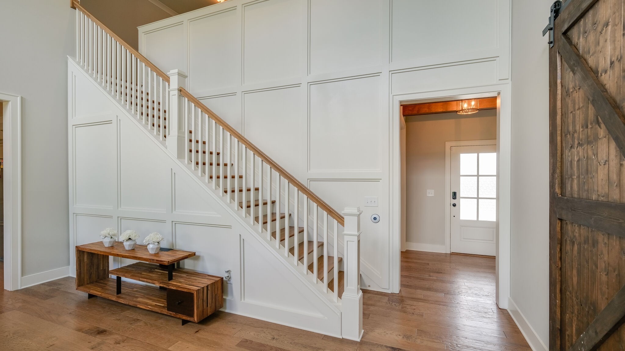779 Plowson Road Mount Juliet, TN 37122 - Photo 9 of 44 a view of staircase with wooden floor and stairs