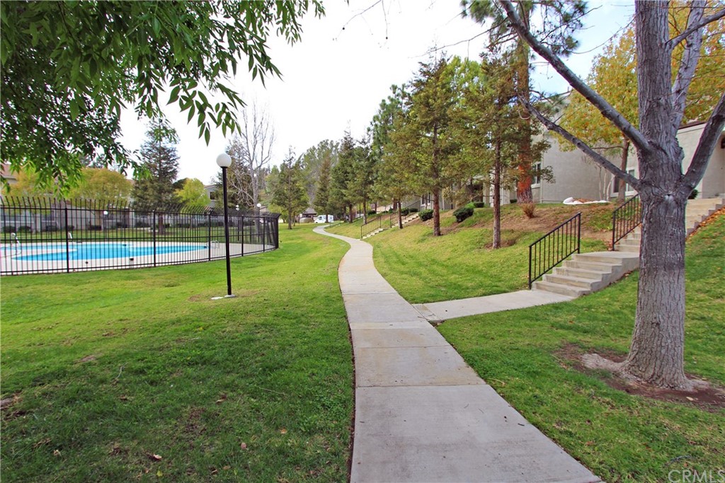 15030 Reedley Street, Unit C Moorpark, CA 93021 - Photo 20 of 23 a view of a park with tree s