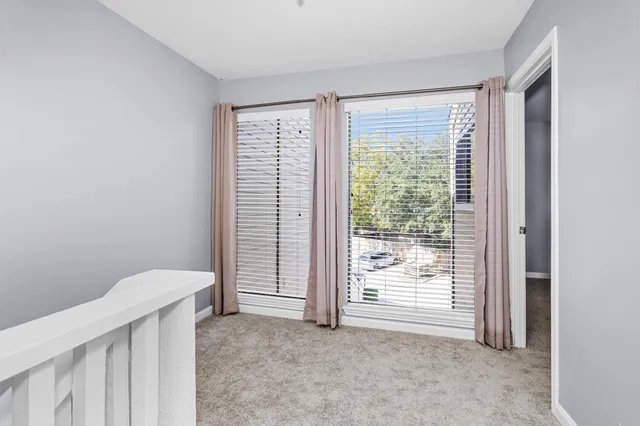 a view of a room that has a window