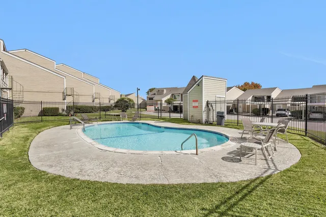 a view of a house with a swimming pool