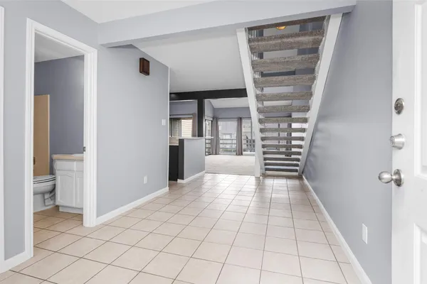 a view of a room with a furniture and storage