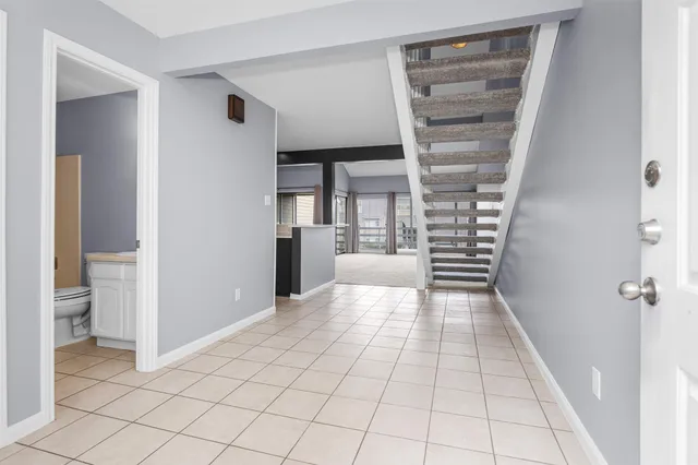 a view of a room with a furniture and storage