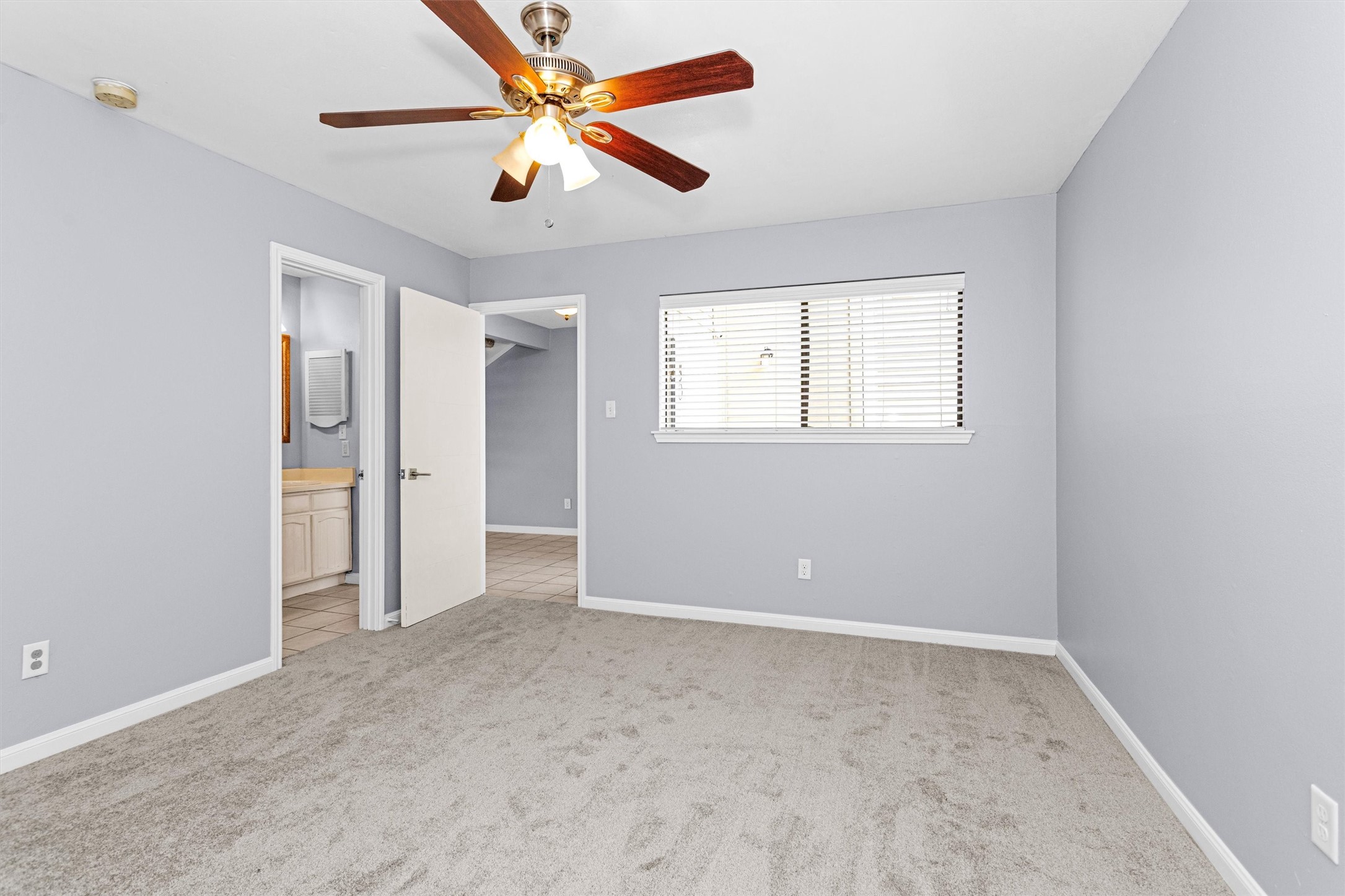 50 April Point Drive South, Unit 50 Conroe, TX 77356 - Photo 7 of 30 a view of an empty room with a window