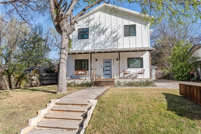 a front view of house with yard