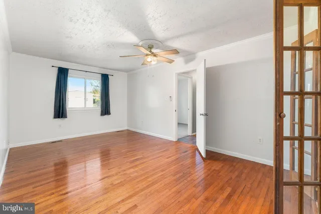 a bathroom with a sink toilet and a mirror