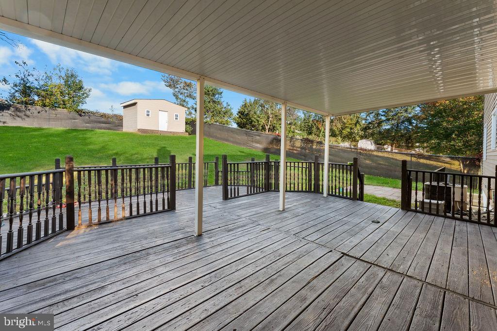 4924 Plata Street Clinton, MD 20735 - Photo 21 of 26 a view of a wooden deck