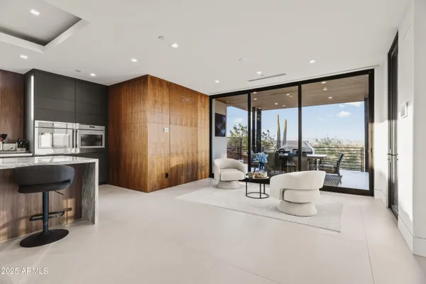 a living room with furniture and a window