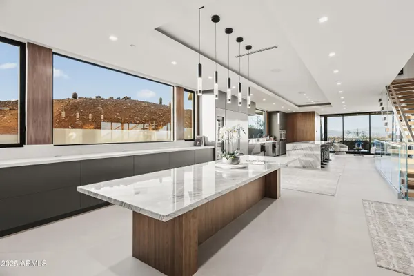 a kitchen with stainless steel appliances lots of counter top space