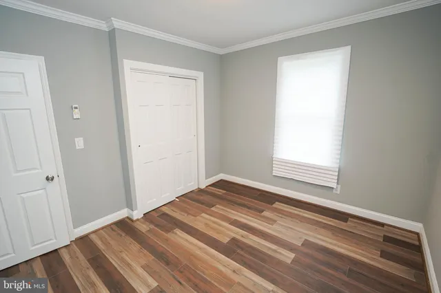 a view of a room that has a window in it