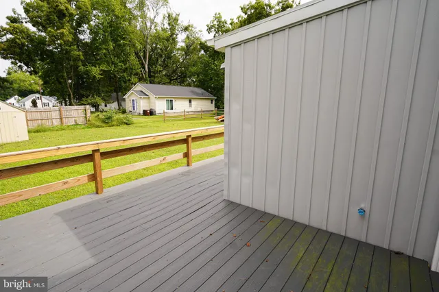 a view of swimming pool with seating space